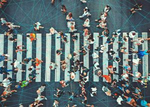 Multiple people crossing a sidewalk on the road with a network of lines connecting them