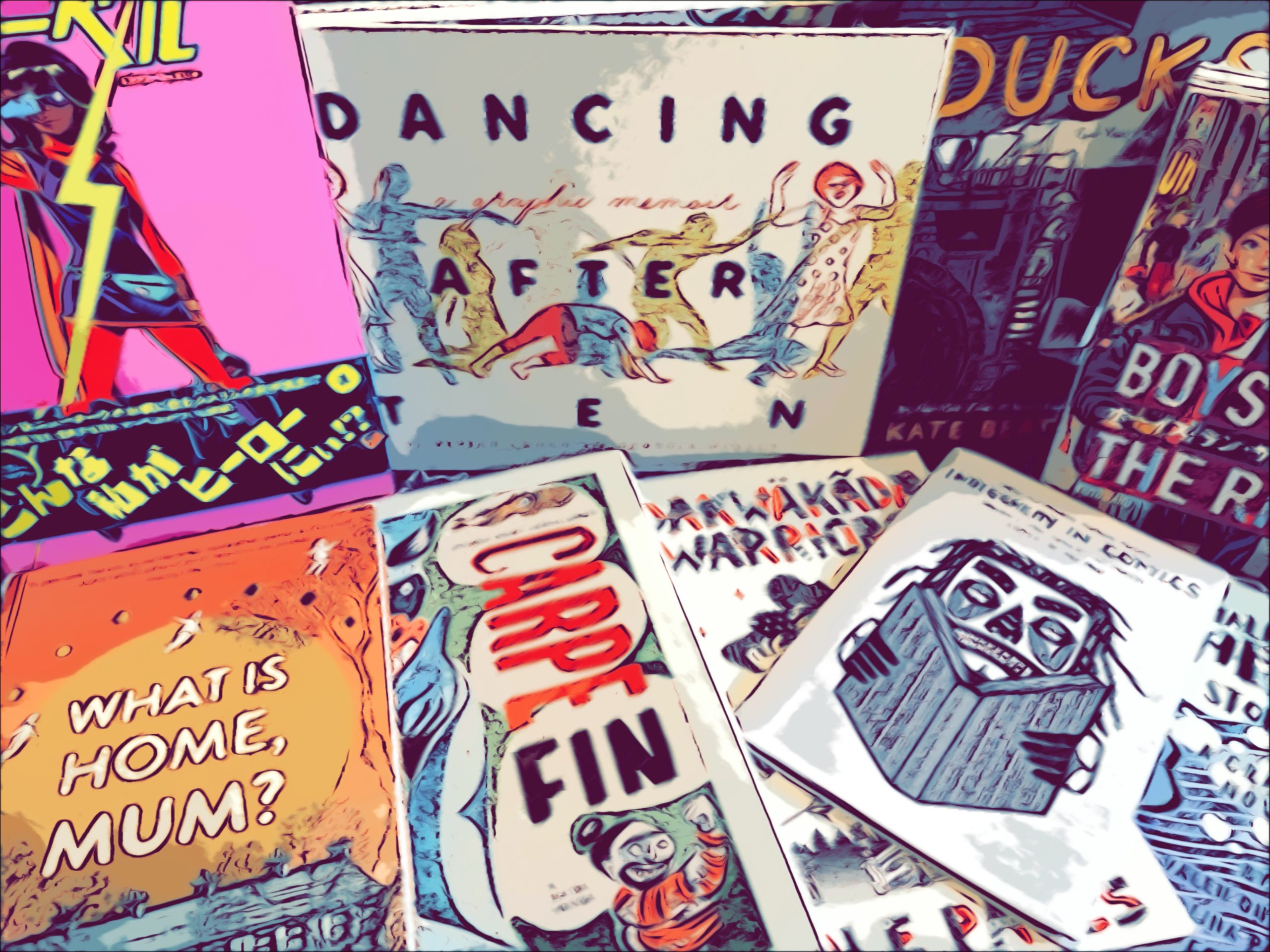 An array of comics, manga and graphic novels are displayed. Titles include Ms. Marvel, in Japanese, as well as Ducks: Two Years in the Oil Sands, Carpe Fin, What is Home, Mum?, and Boys Run the Riot in English. Additional comics are present, but their titles are cut off.